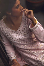 Load image into Gallery viewer, Maryam Raza in Aafrinish Pale Pink Chikankari and Gota shirt, Izaar and dupatta. Shot in an old havelli. Midshot. Details.
