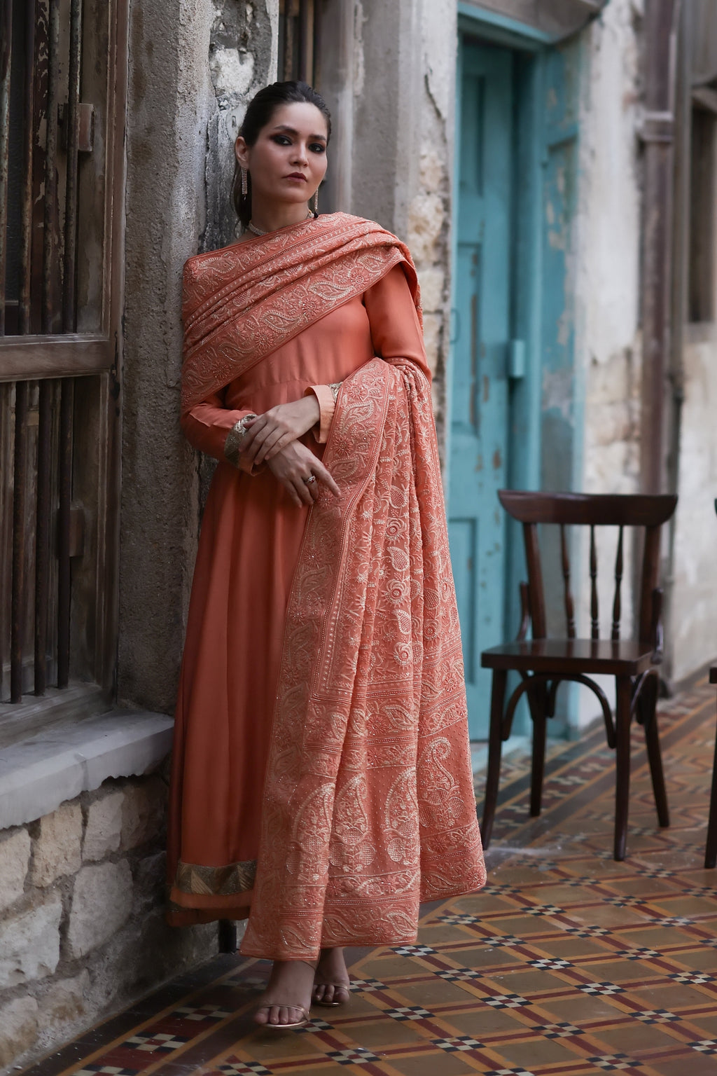 Aafrinish By Niazi Fahmeen Ansari Rizwan Ul Haq Burnt Orange Chikankari Chaadar & Peshwaz Stun in the rich hues of our Burnt Orange Chikankari chaadar Pakistan Fashion