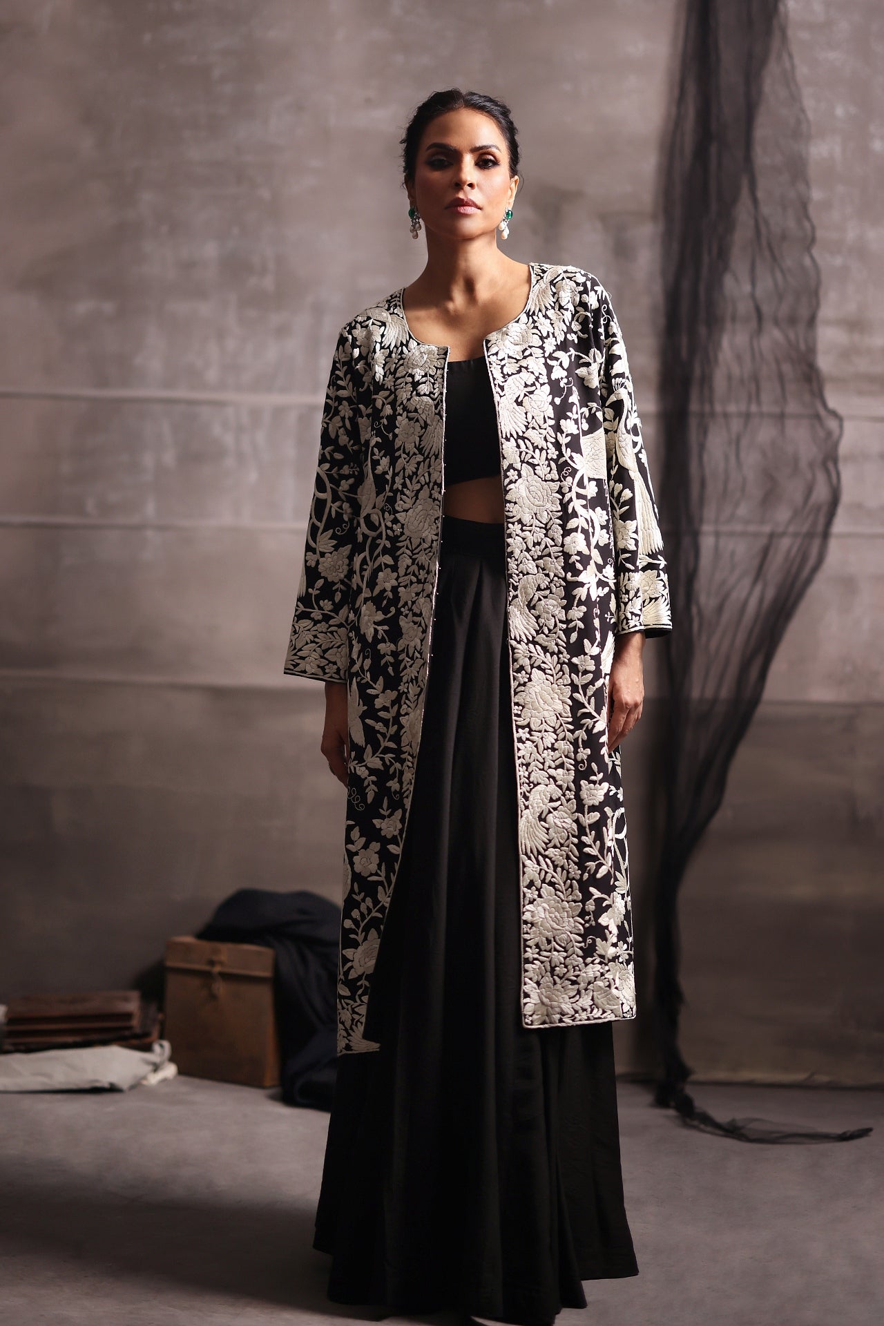 Aafrinish By Niazi Fouzia Aman Rizwan Ul Haq Black & White Parsi Gara Jacket Featuring birds in flight, blooming flowers, and gleaming details Pakistan Fashion