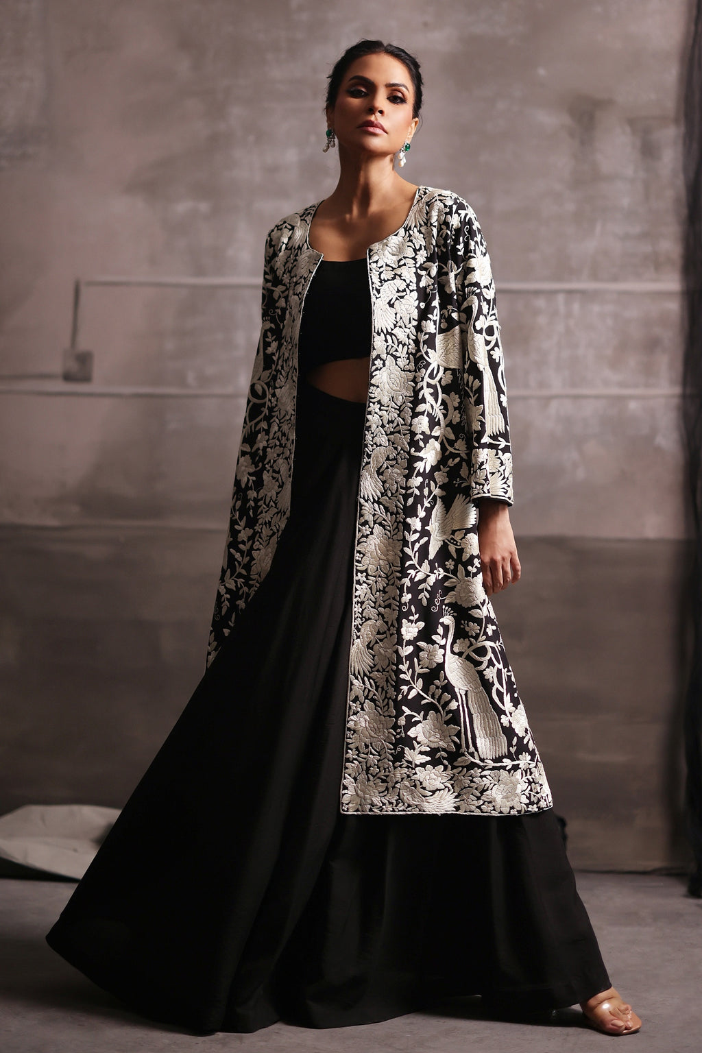 Aafrinish By Niazi Fouzia Aman Rizwan Ul Haq Black & White Parsi Gara Jacket Featuring birds in flight, blooming flowers, and gleaming details Pakistan Fashion