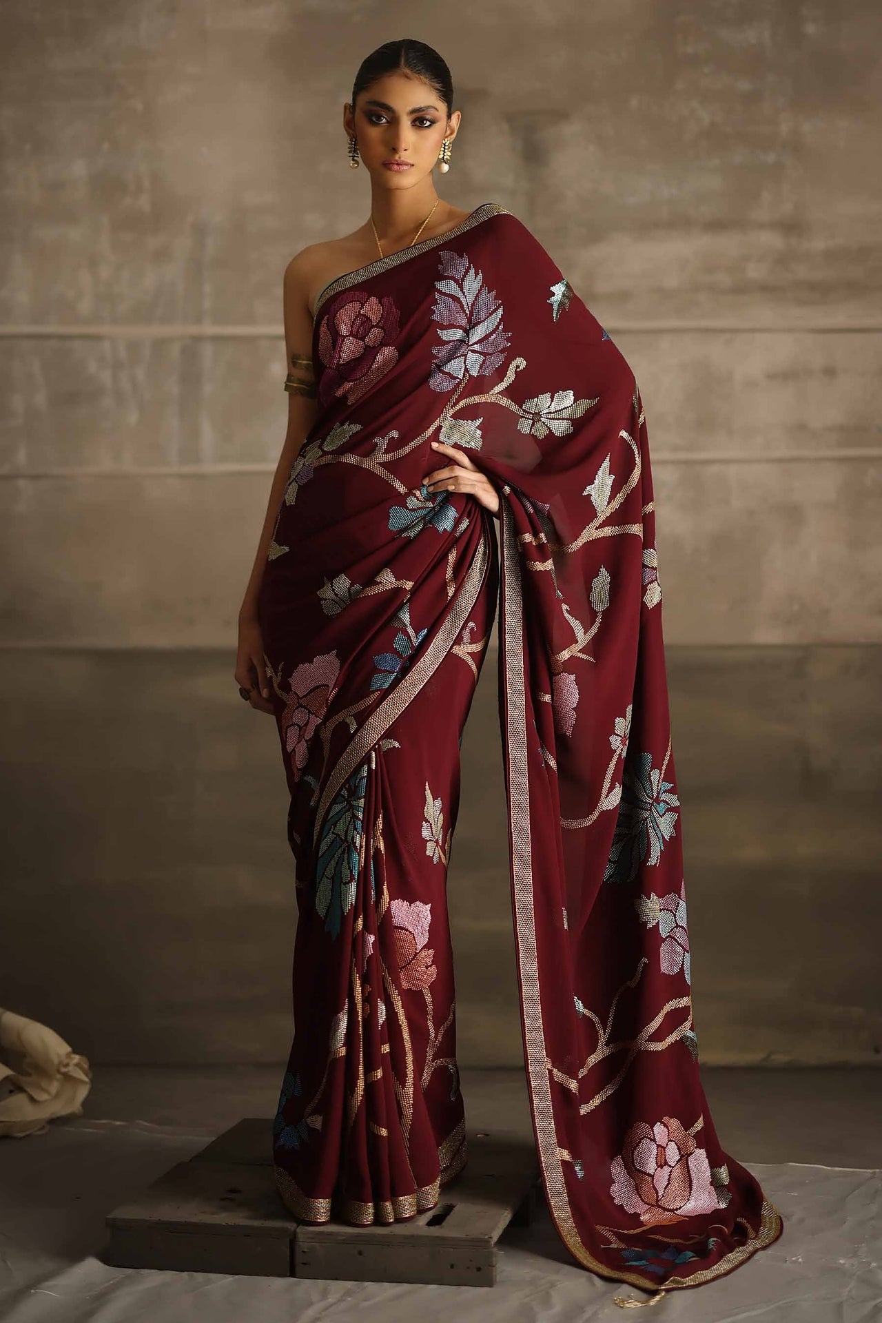 Aafrinish By Niazi Eshal Rahman Rizwan Ul Haq Deep Wine Cutdaana & Sequins Saree the rich hues of our deep wine Chiffon saree intricately detailed with floral motifs in glimmering sequins Pakistan Fashion