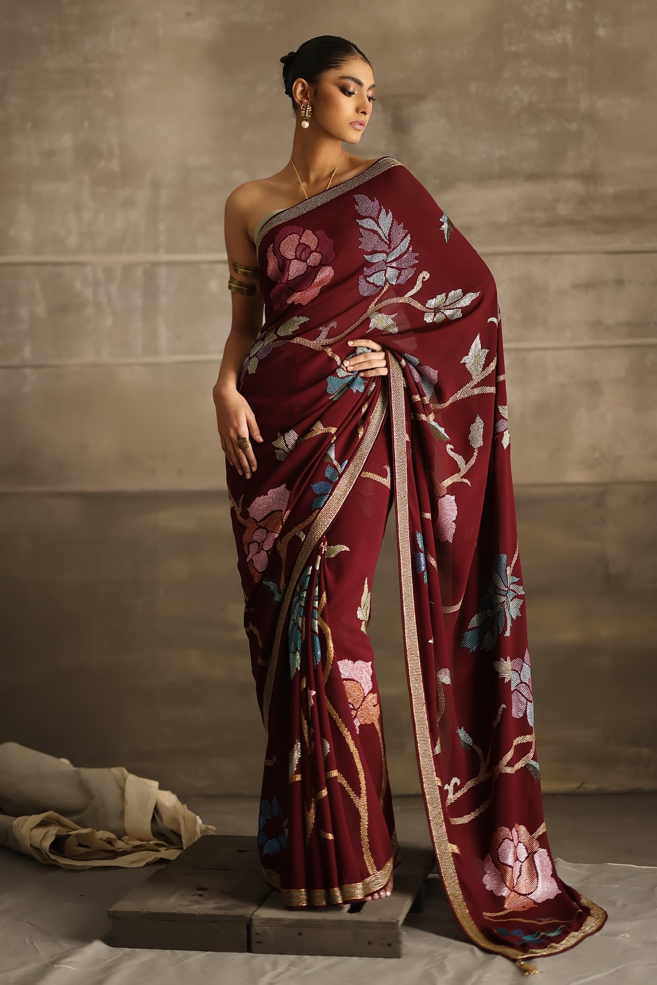 Aafrinish By Niazi Eshal Rahman Rizwan Ul Haq Deep Wine Cutdaana & Sequins Saree the rich hues of our deep wine Chiffon saree intricately detailed with floral motifs in glimmering sequins Pakistan Fashion