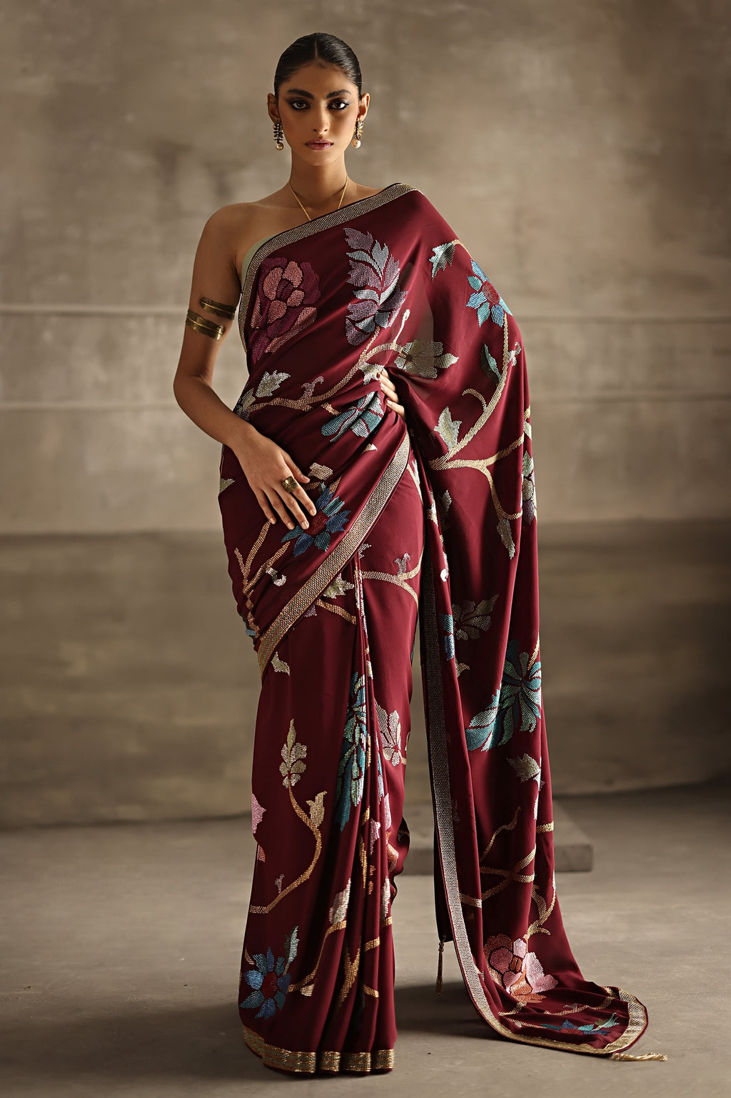 Aafrinish By Niazi Eshal Rahman Rizwan Ul Haq Deep Wine Cutdaana & Sequins Saree the rich hues of our deep wine Chiffon saree intricately detailed with floral motifs in glimmering sequins Pakistan Fashion
