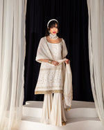 Load image into Gallery viewer, Aafrinish By Niazi Zara Peerzada Noor Jehan Se Noor 70s Chikankari Short Kurta, Dupatta &amp; Gharara Pants  Blue  Background Asad Bin Javed Vintage Pakistan Fashion
