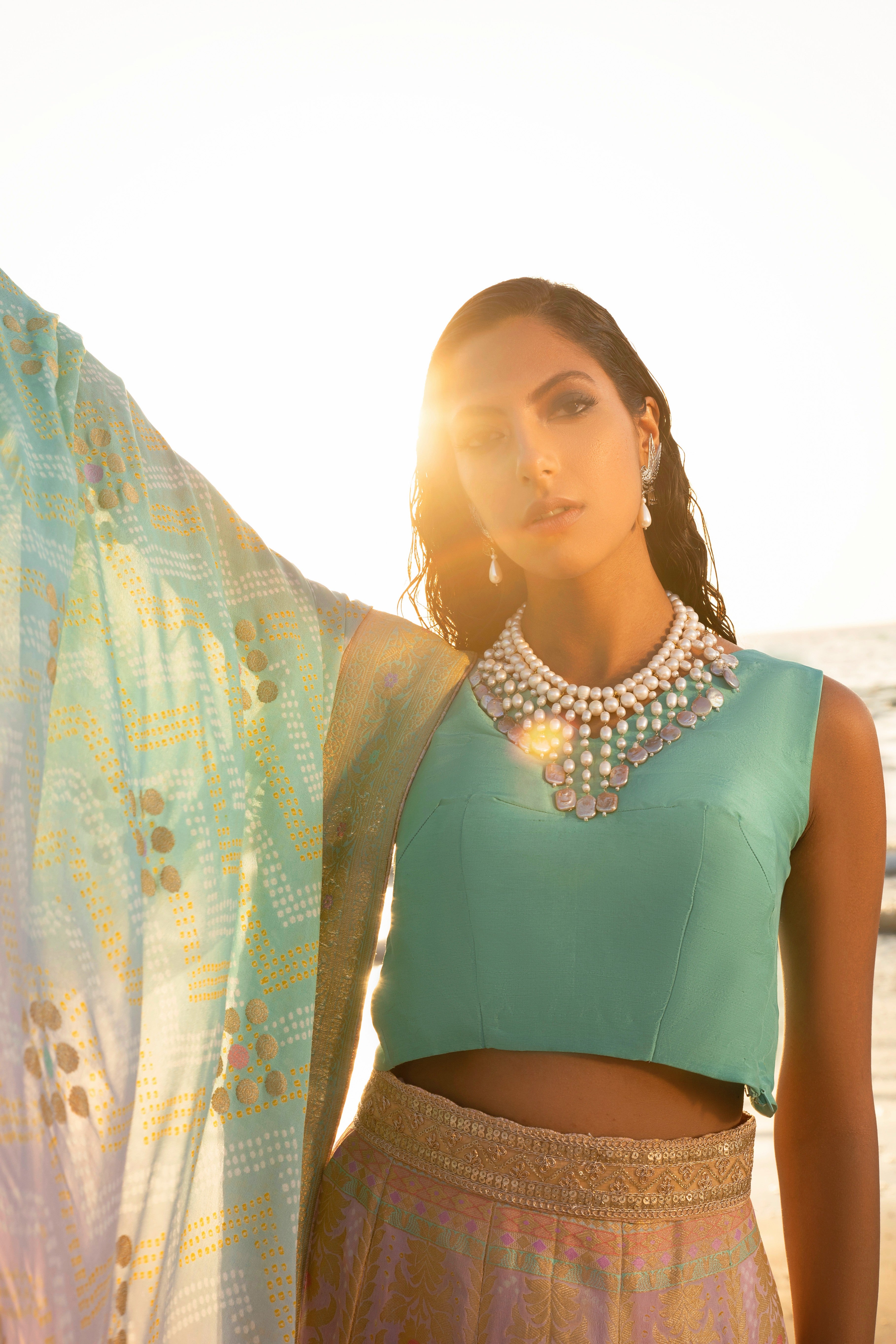 Aafrinish By Niazi Nimra Jacob Gibran Jamshed Mubarak Village Beach Pastel pink, Lavender and Turquoise Lehnga Choli Pakistan Fashion Soothing